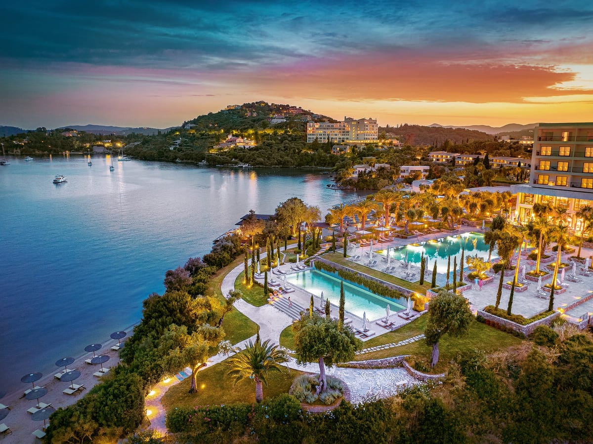 The resort and Kommeno bay at twilight, Grecotel Corfu Imperial